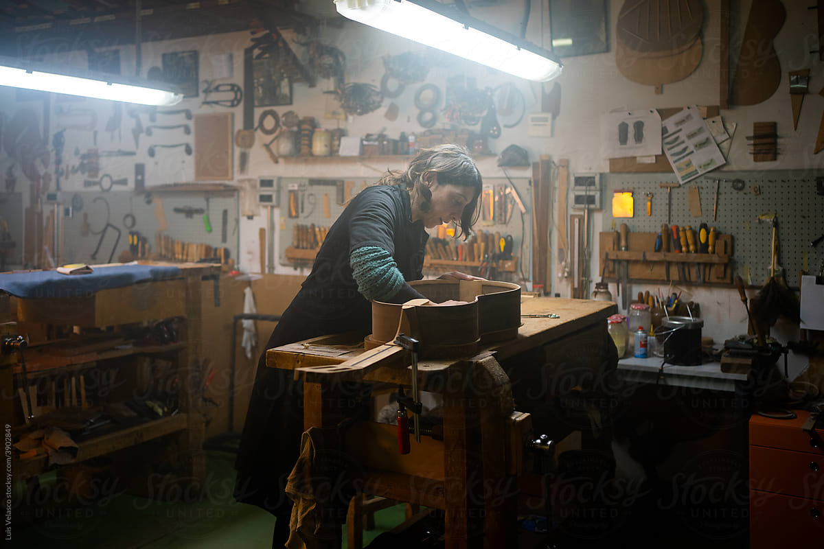 Guitar Maker, Luthier Working In A Guitar Workshop.
