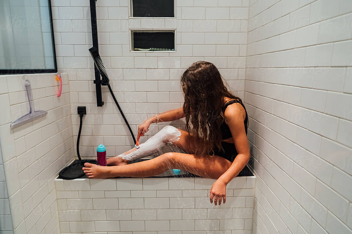 Documenting a girl shaving her legs.