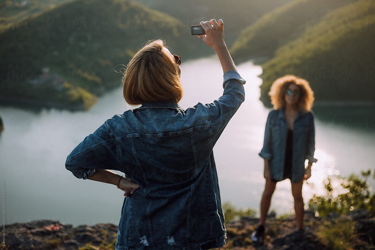 Friends Taking Photos In Nature