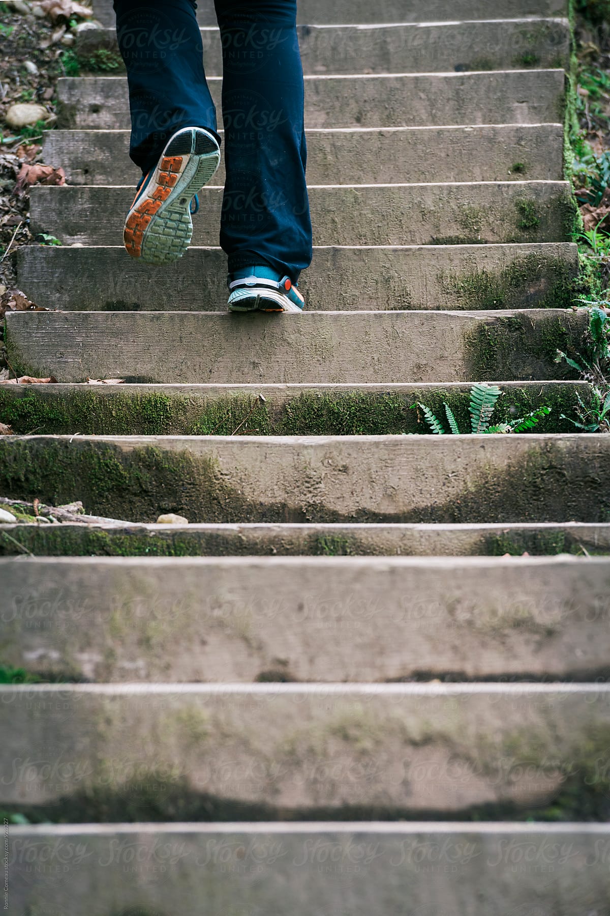 Person Climbing Steep Stairs For Fitness