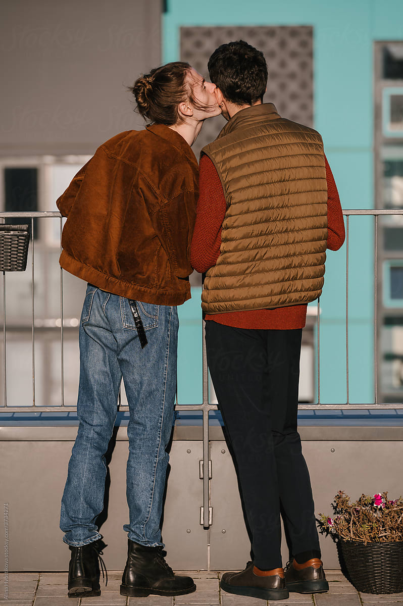 Gay Couple Kissing On Terrace Del Colaborador De Stocksy Alina Hvostikova Stocksy 