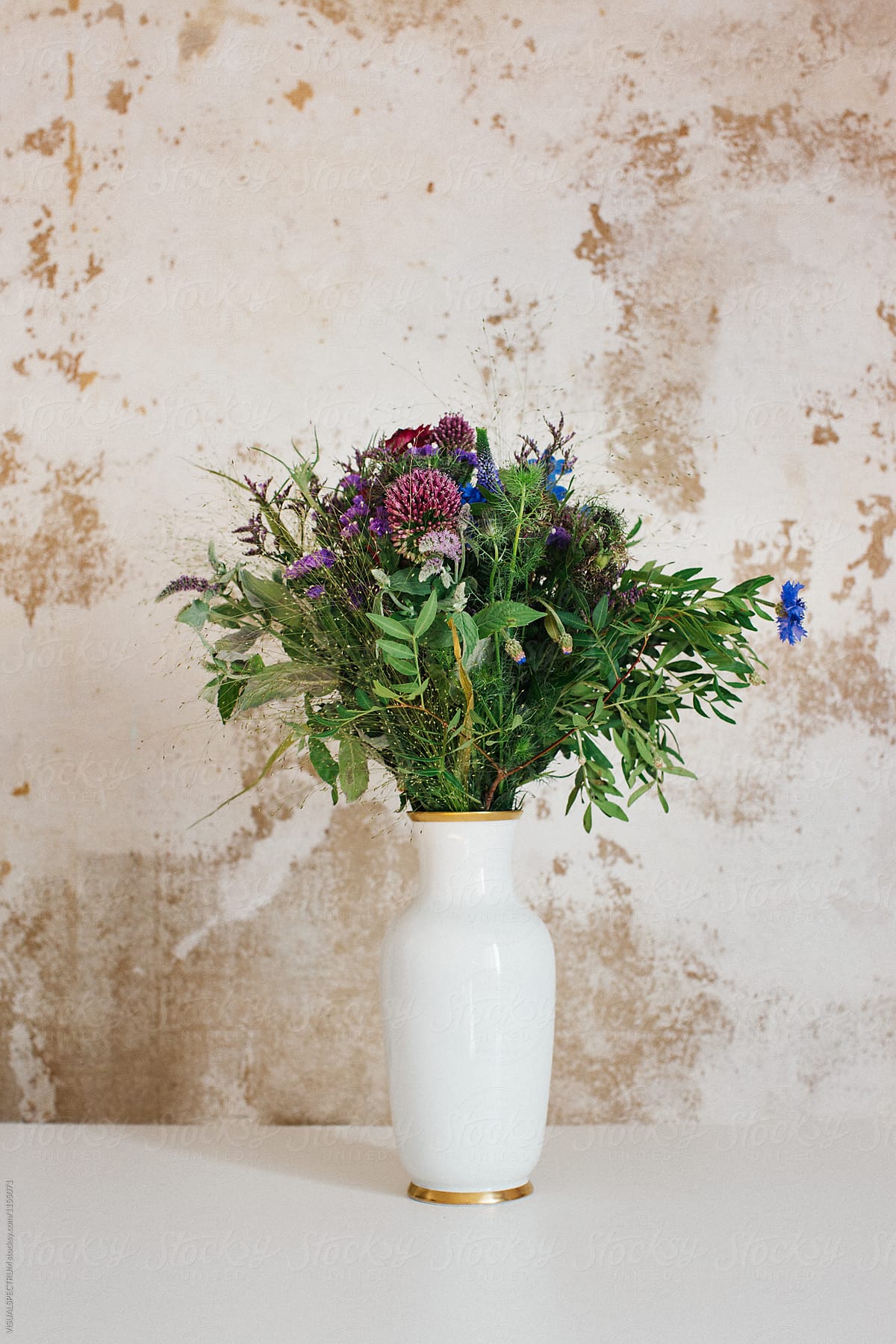 Wild Flower Bouquet in White Vintage Vase