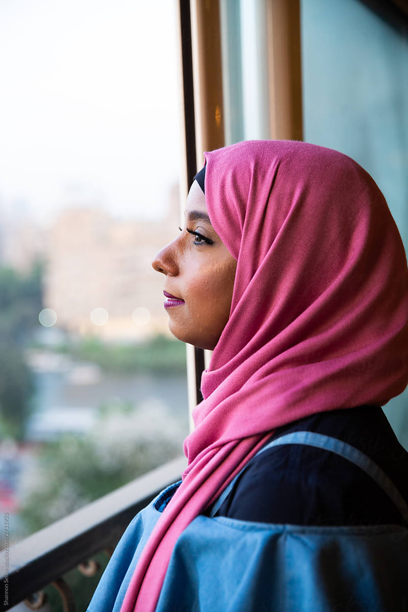 Pensive Veiled Egyptian Woman In Pink Hajib