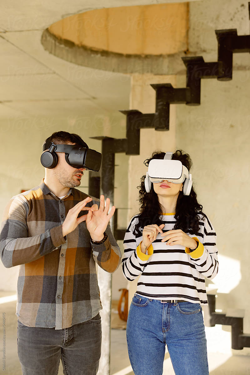 Newlyweds Watch VR Glasses View Interior Design Plan