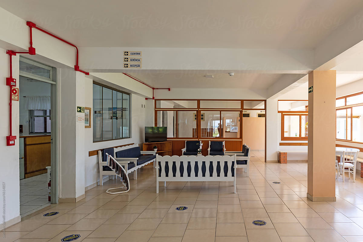 Lobby and reception of a vintage hotel with seating area