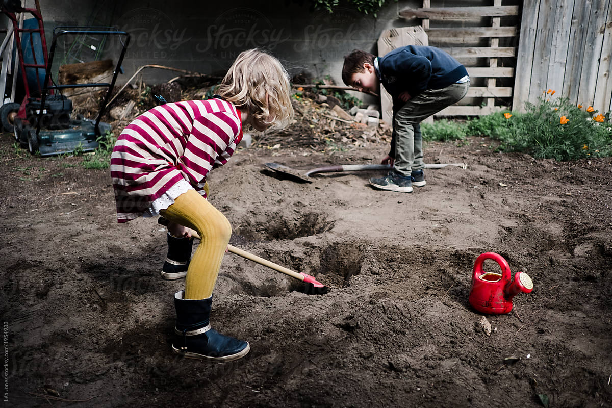 little girl and her friend gardening