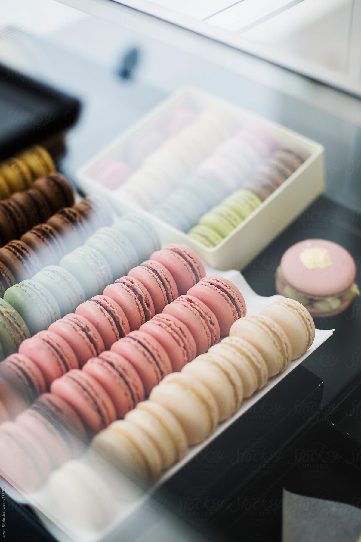 Close up of a display case with colorful macaroons