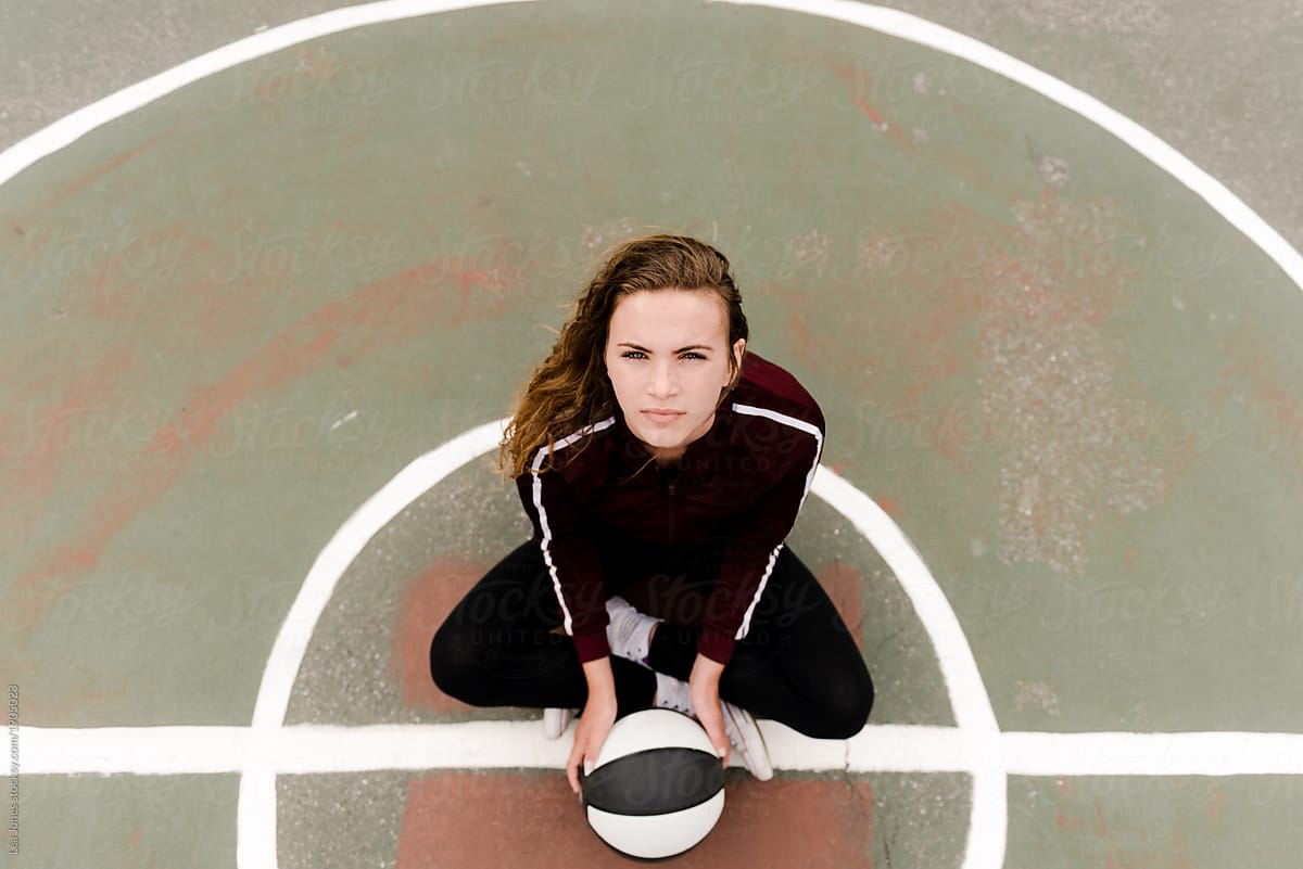 young woman with basketball
