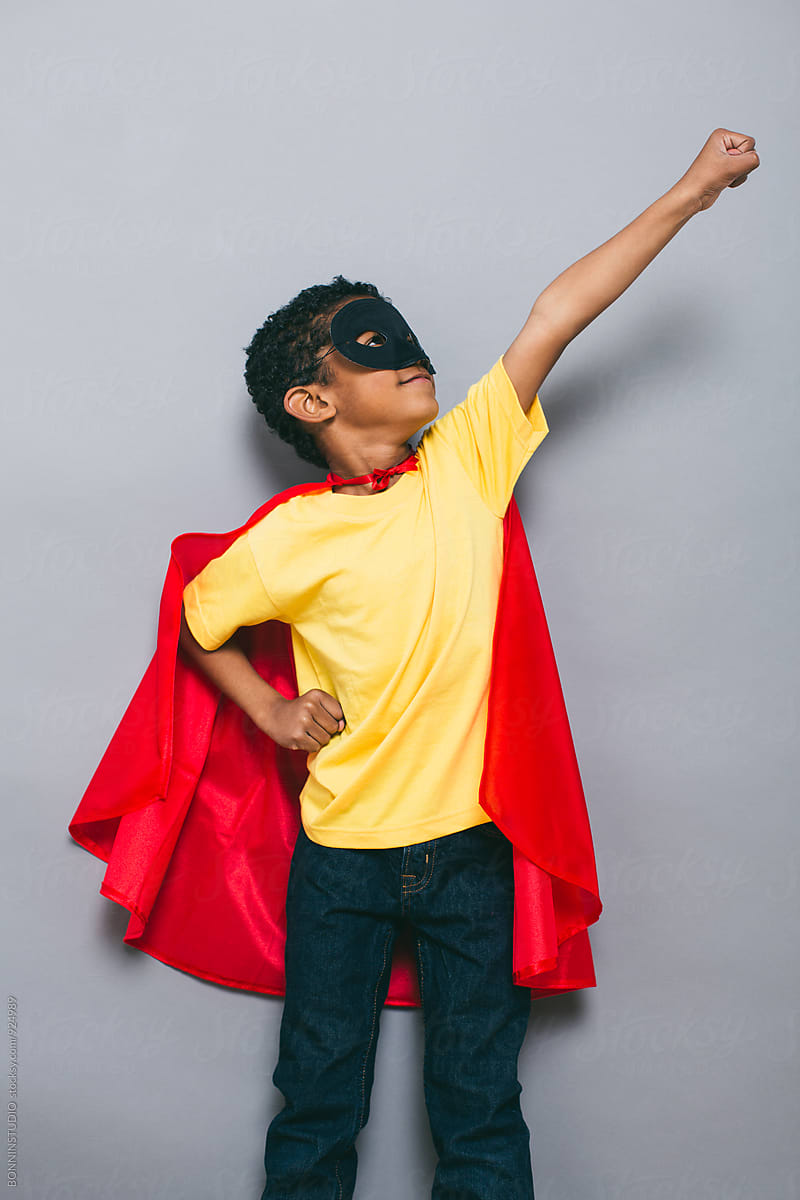 Little boy with Superhero costume.