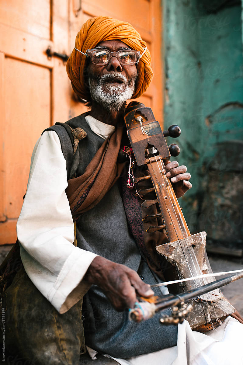 Indian musician, senior man with sarangi