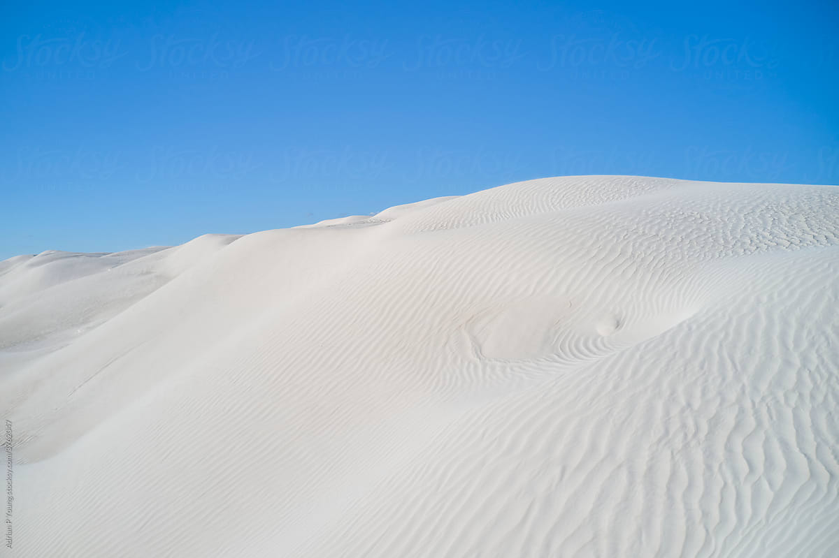 Sand Dunes against Blue Sky