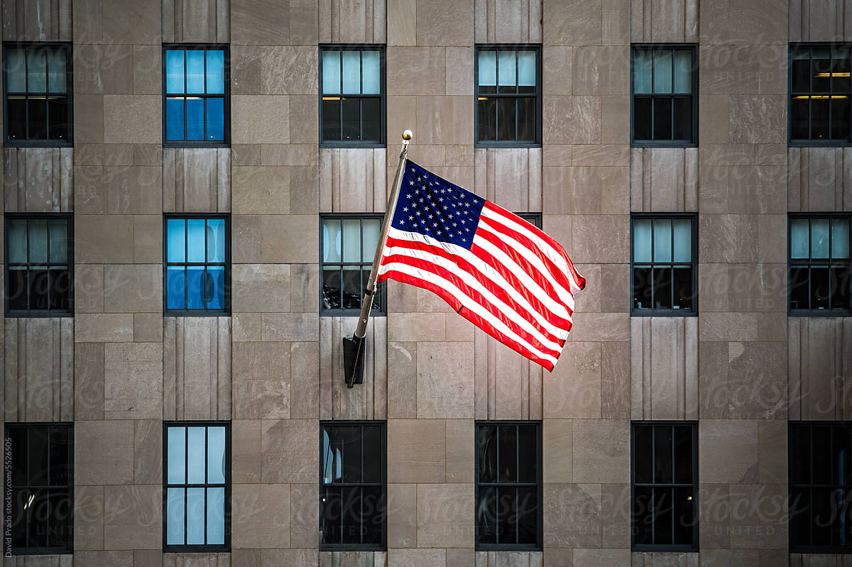 American flag on city building