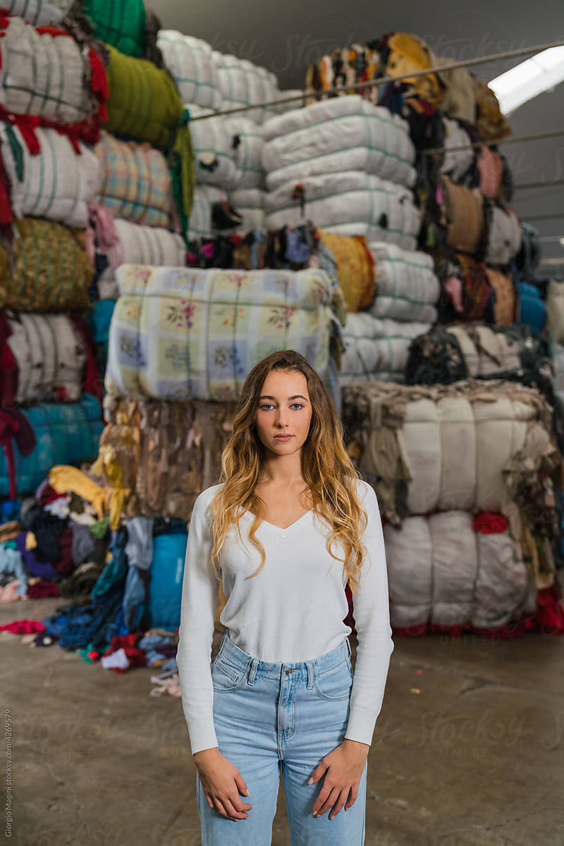 Young Woman in a Fabrics Recycling Factory