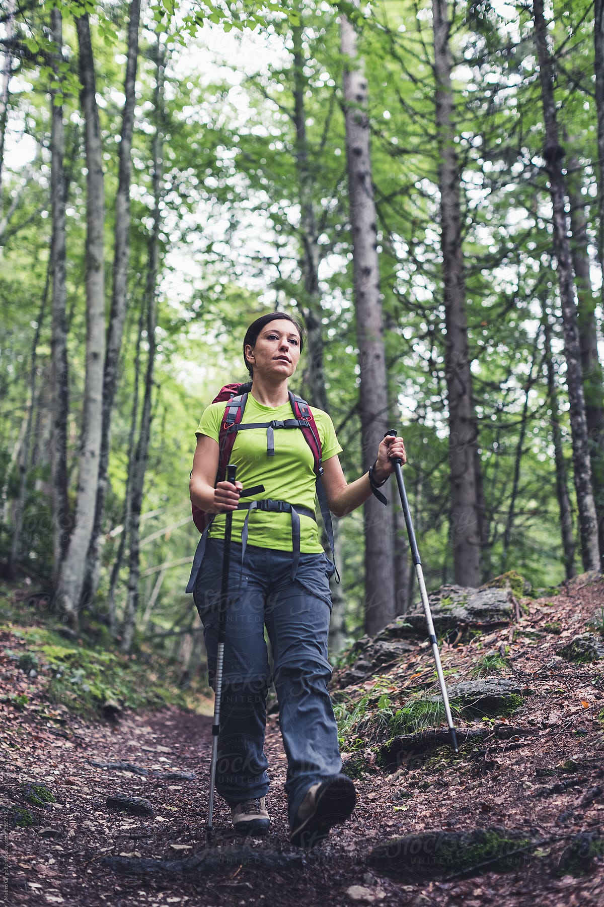 A female mountaineer coming down the trail