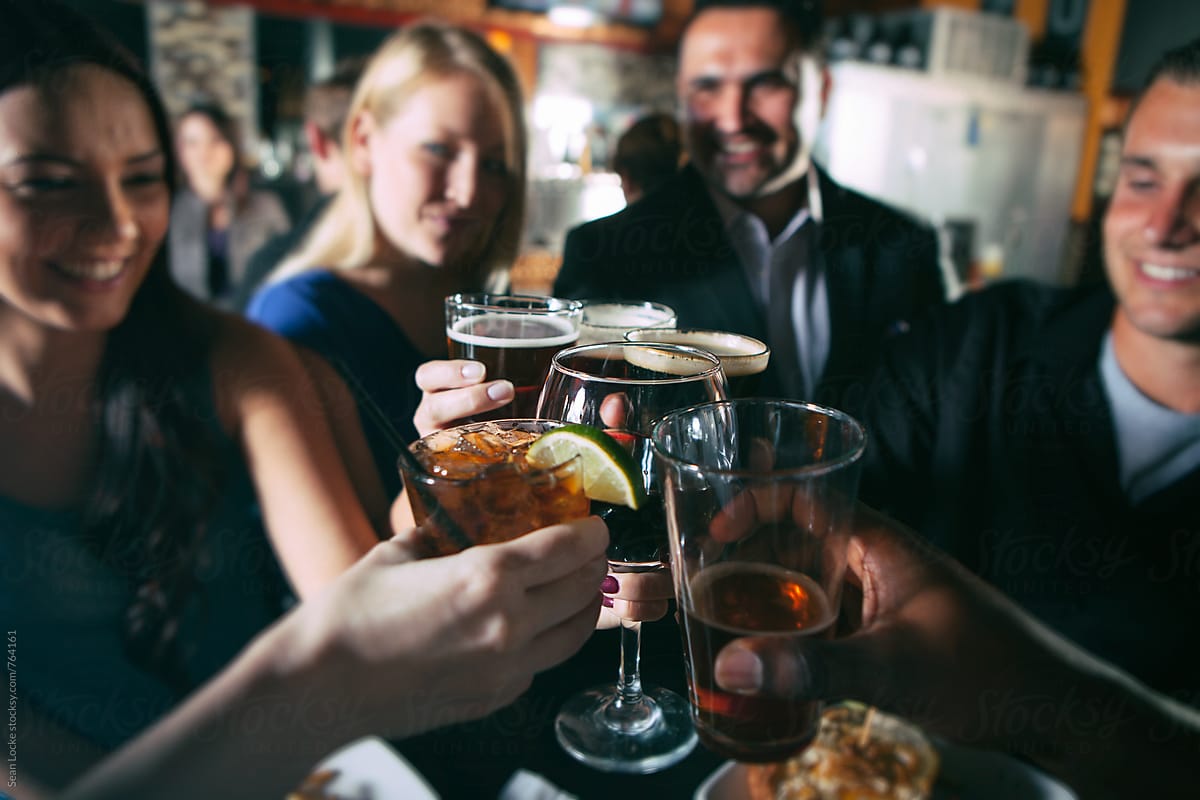 Bar: Friends Get Together For A Celebration Toast