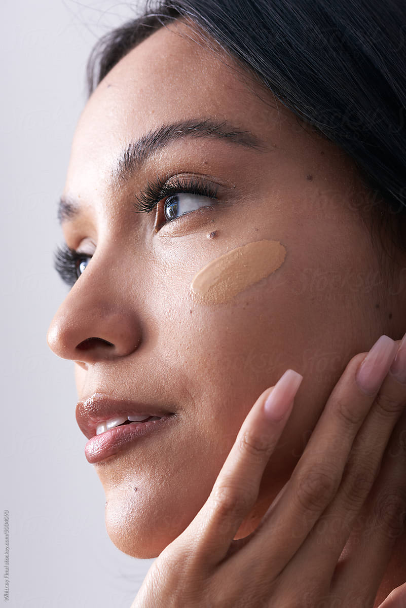 Latina Female Model Featuring Luxurious Foundation on Face