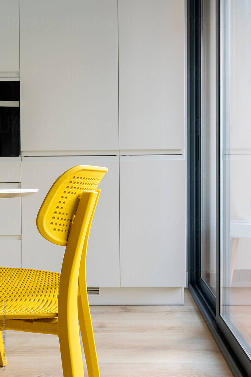 stylish Kitchen with yellow chair
