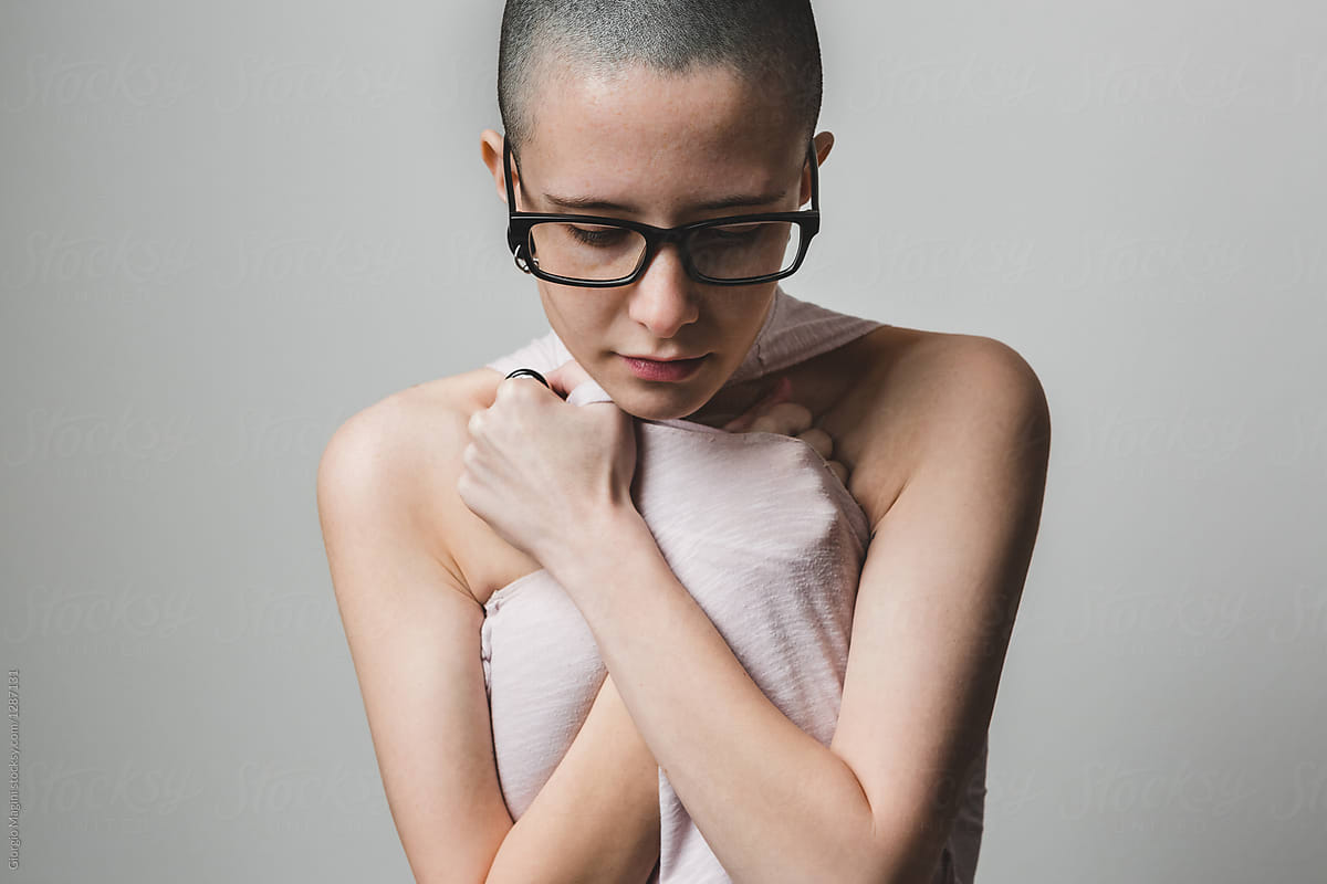 Androgynous Young Woman Hiding her Feminine Body