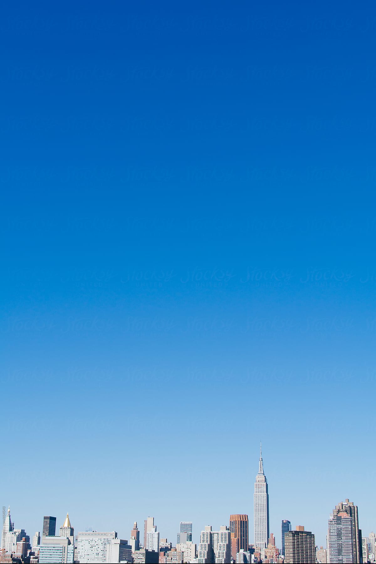 New York City skyline with blue sky