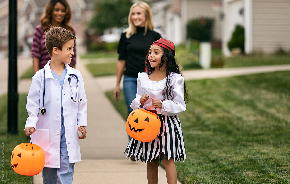 Trick or Treat: Kids Out On Halloween With Moms Along