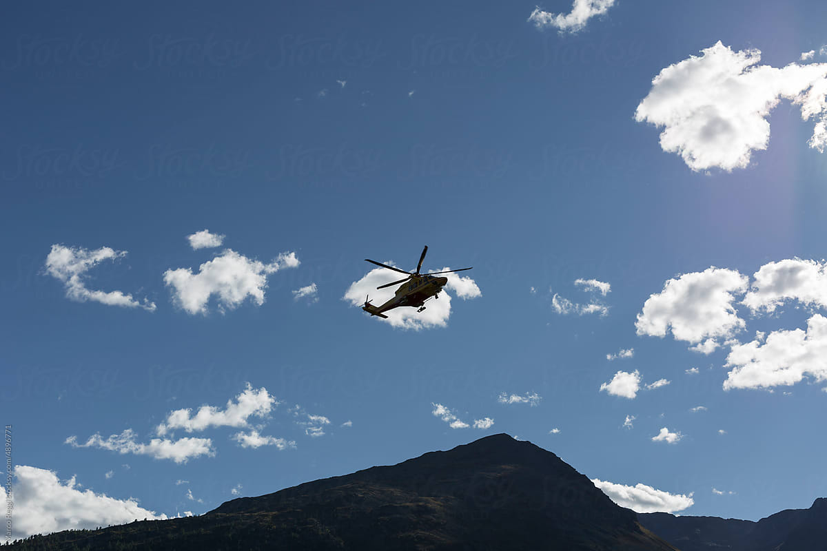 Rescue Helicopter over the mountains
