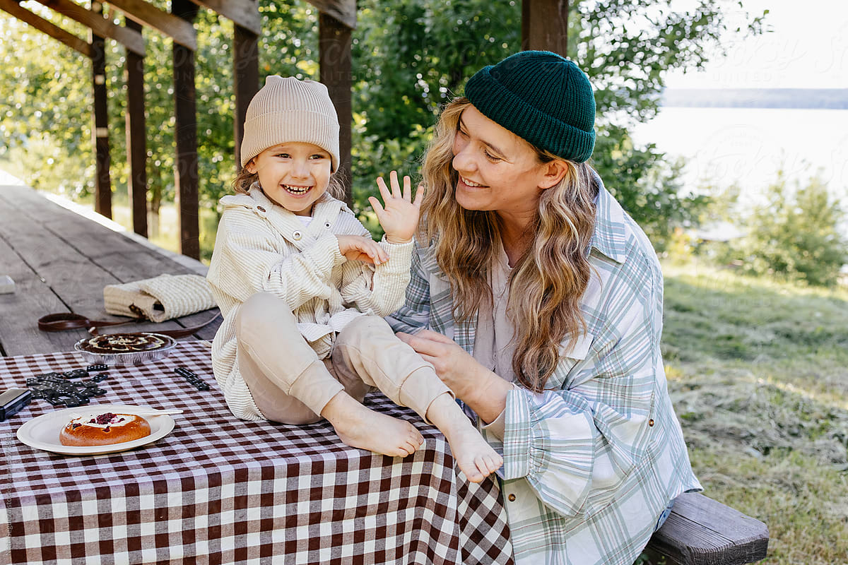 A woman and her daughter on a picnic