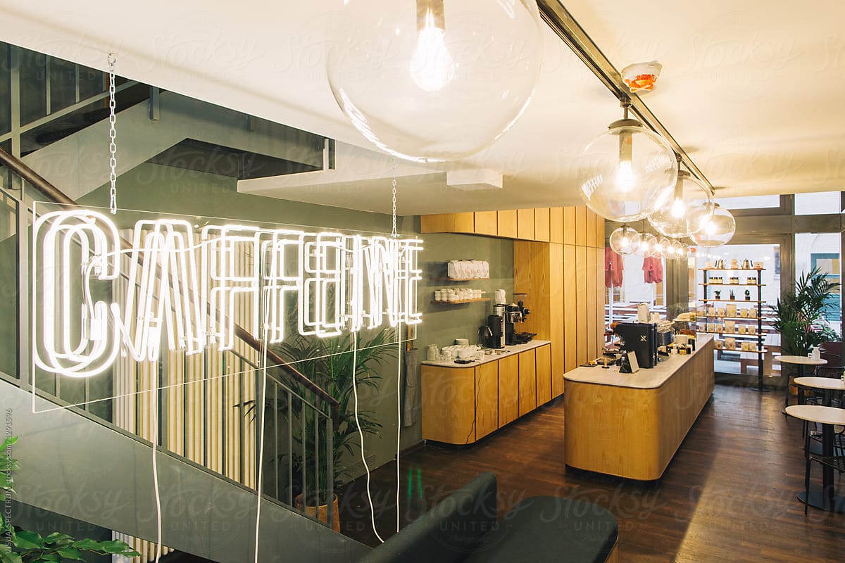 Contemporary Specialty Café With the Word Caffeine in Illuminated Letters