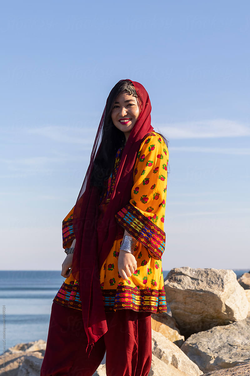 Standing Young Afghani Woman Portrait in Traditional Dress