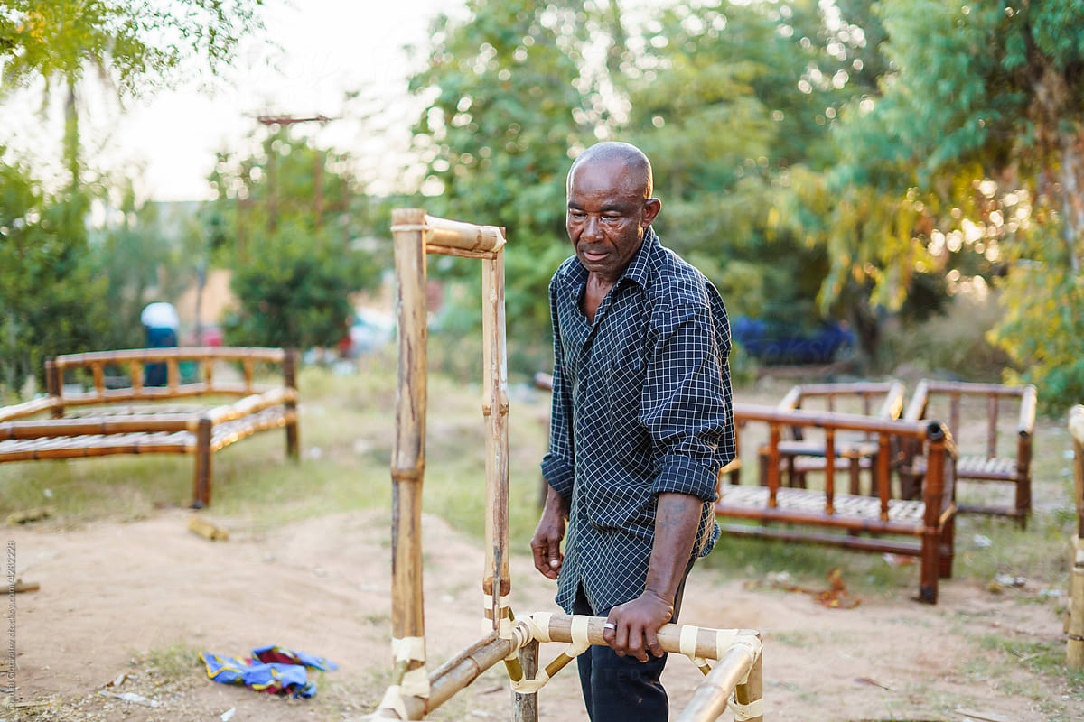 Man working with wood in countryside