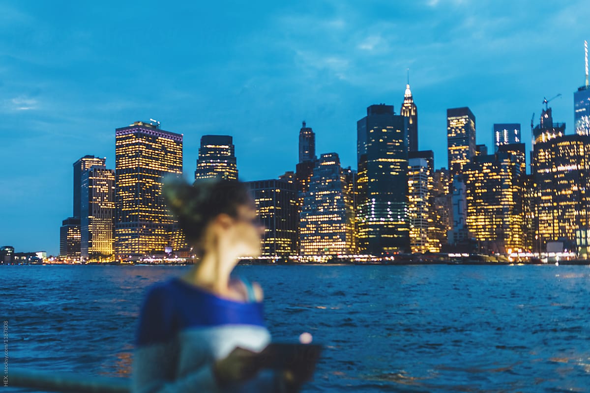 Young Woman Defocused in Front of the Manhattan Skyline