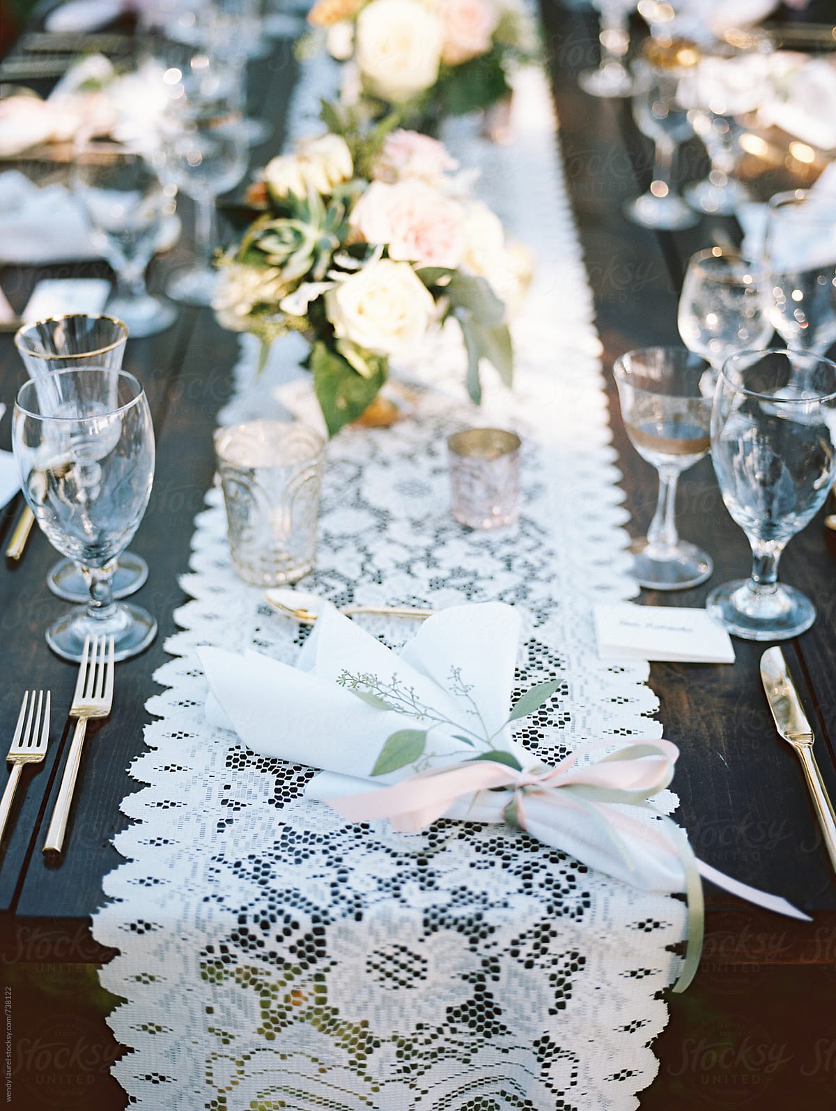 lace table runner and table set for gorgeous wedding on film