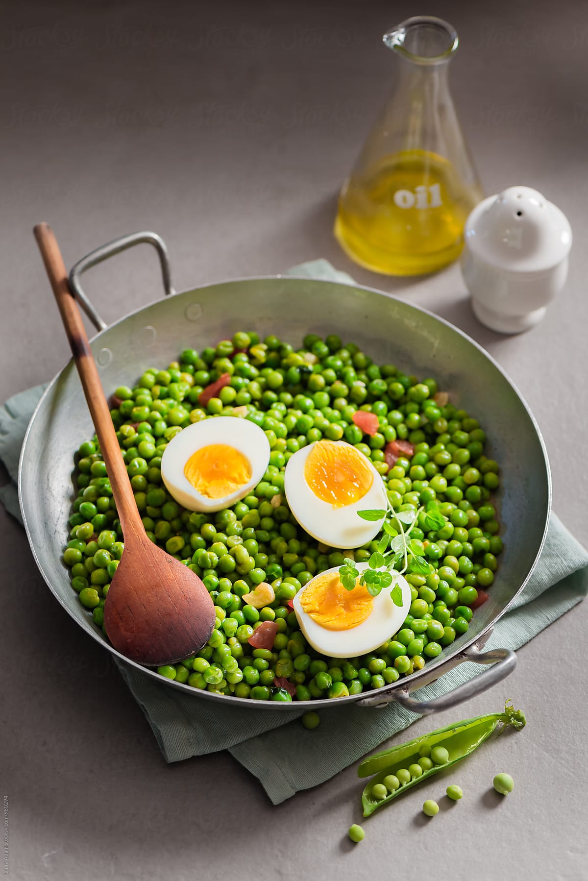 Stewed peas and boiled eggs in a saucepan
