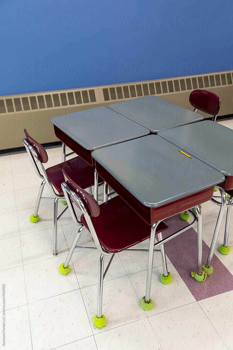 School Classroom Interior with Desk and Chairs with Tennis balls