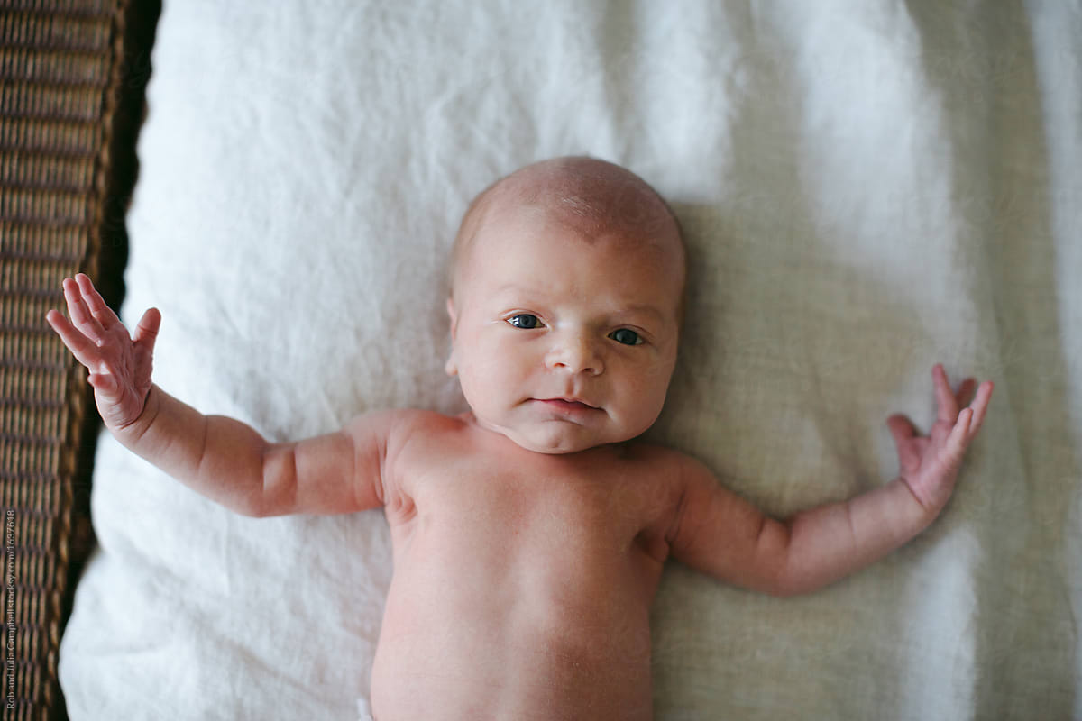 Cute Naked Baby On Bed by Rob And Julia Campbell