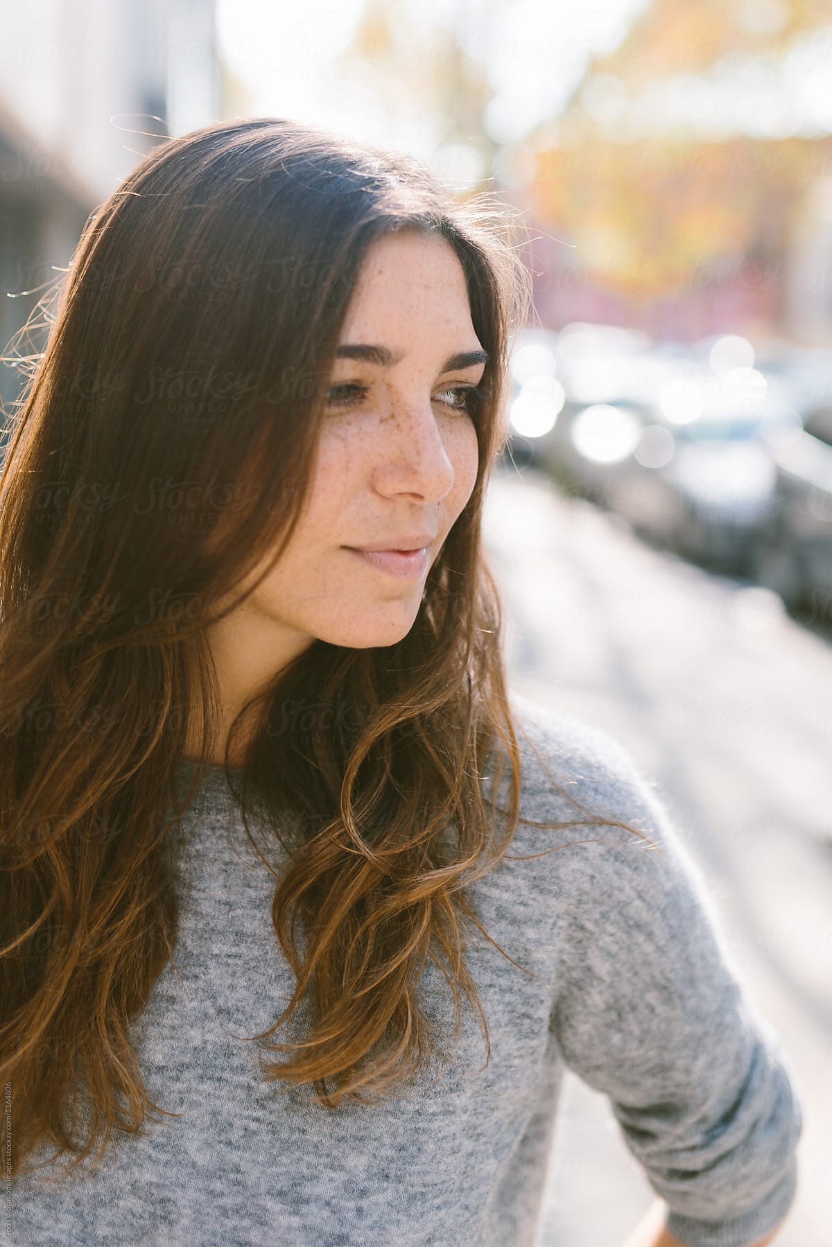 Portrait Of A Beautiful Woman During A Sunny Autumn Day Del