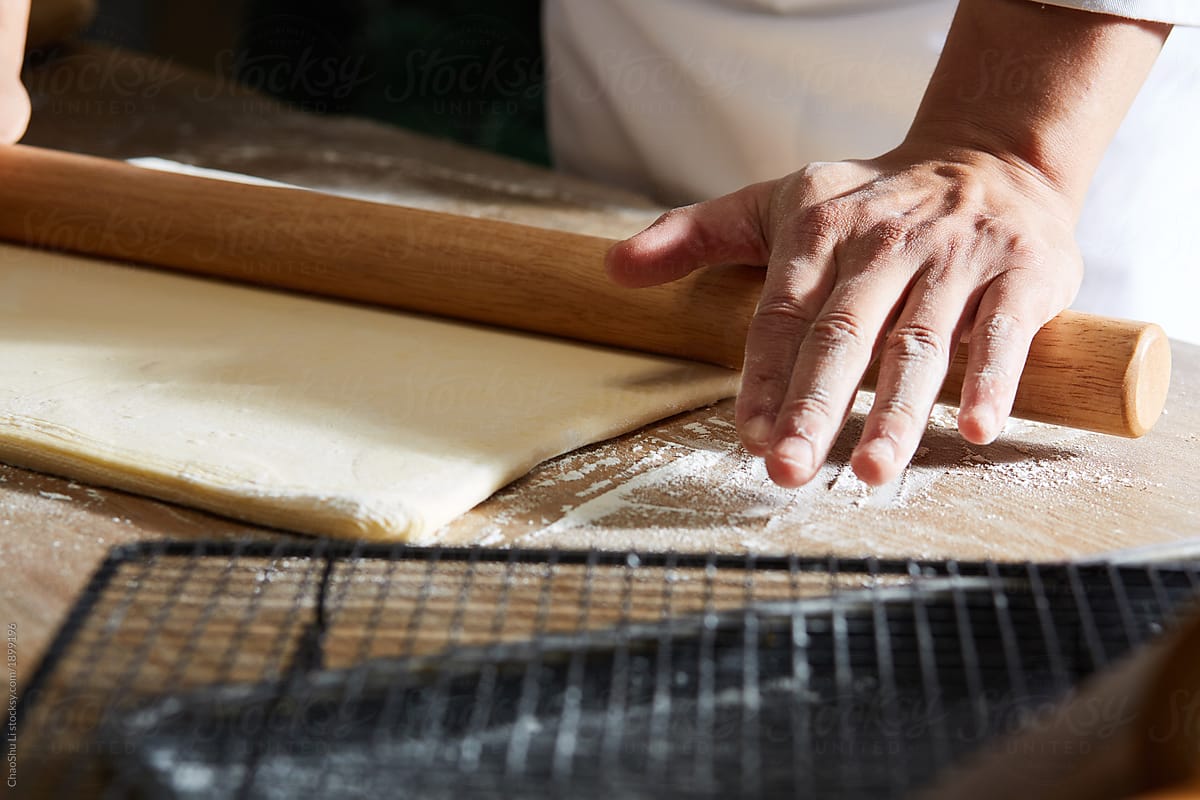 The process of making cantonese bread by hand is done in a sunshine making workshop