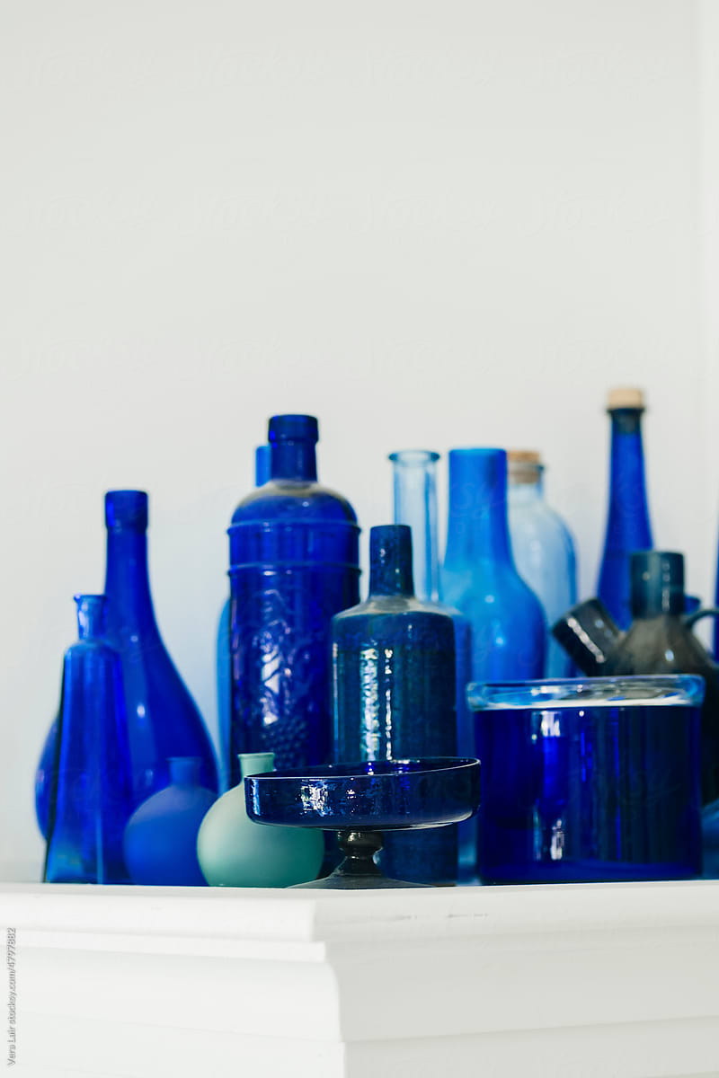 Collection of blue glass bottles