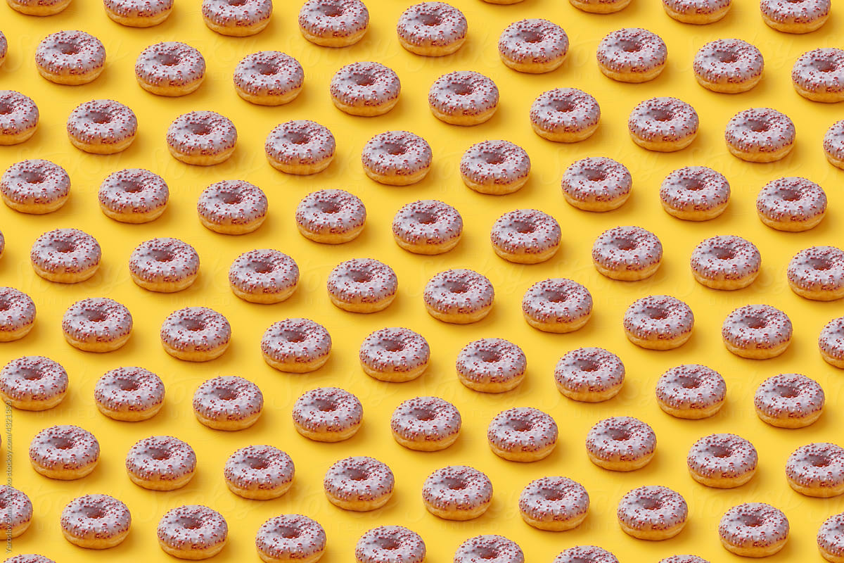 Pattern of yummy donuts with sprinkles