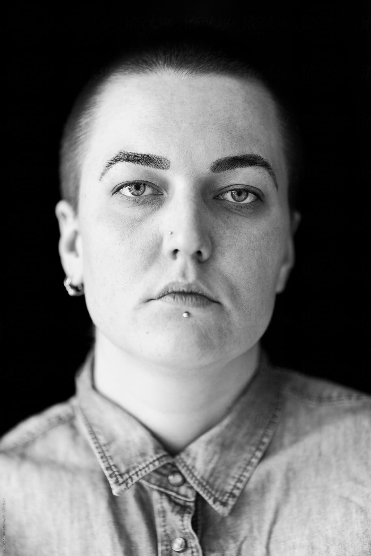 portrait of real lesbian woman on the black background
