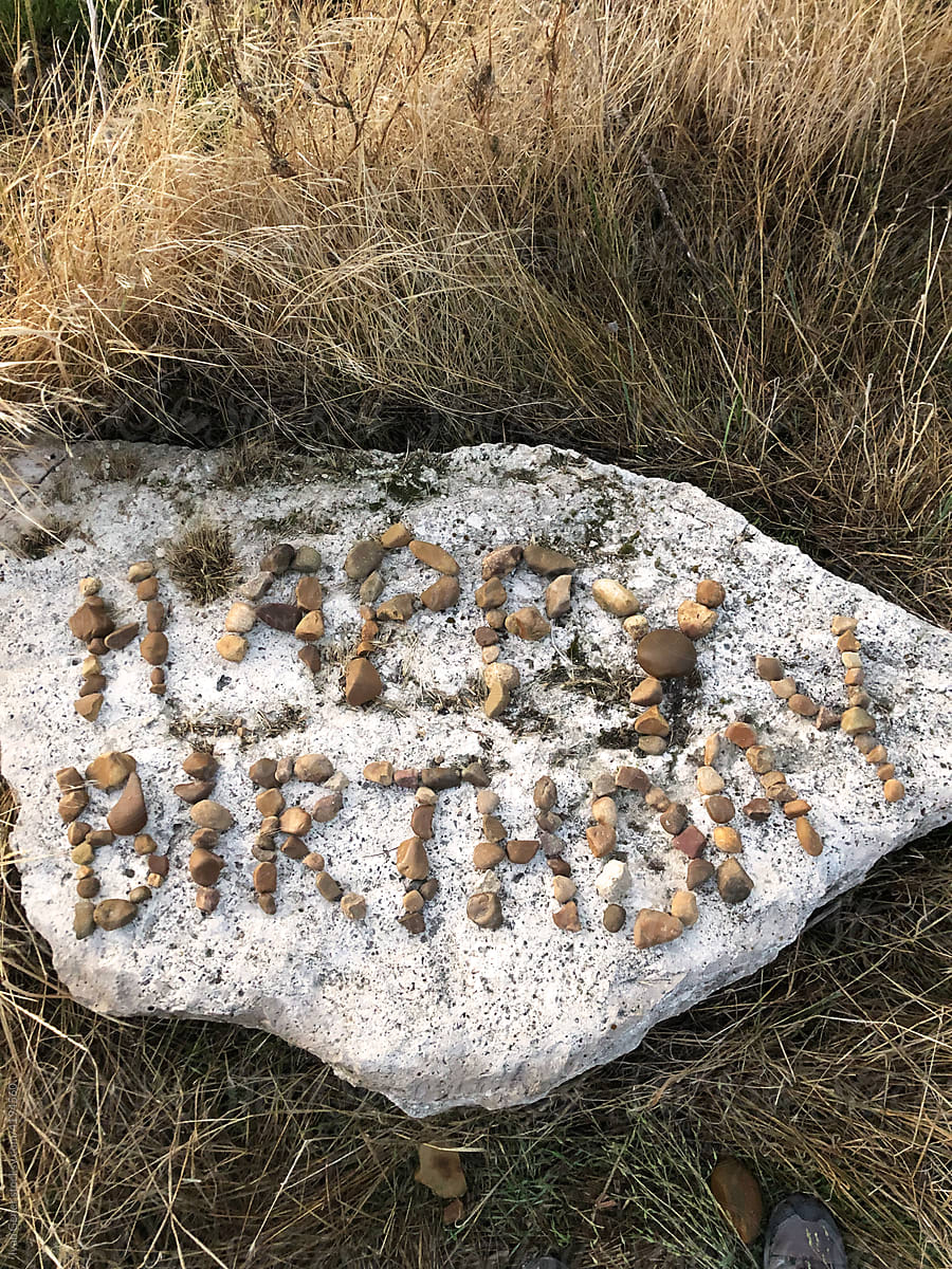 Happy birthday message on a rock outside