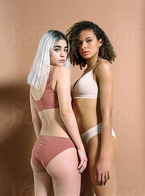 Embracing Female Models In Sport Underwear by Stocksy Contributor Javier  Díez - Stocksy