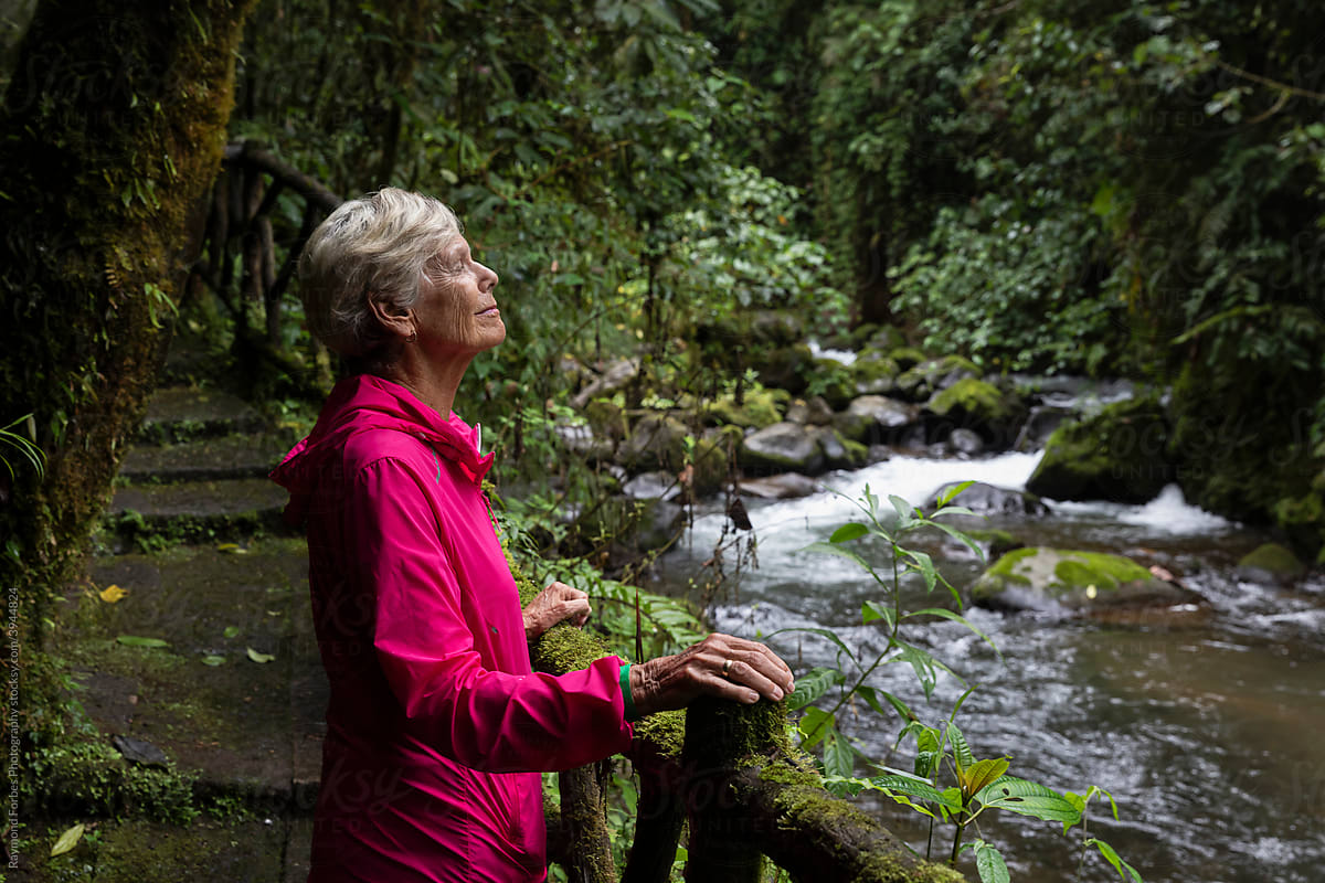 Elderly Woman hiking in Costa Rican Rainforest