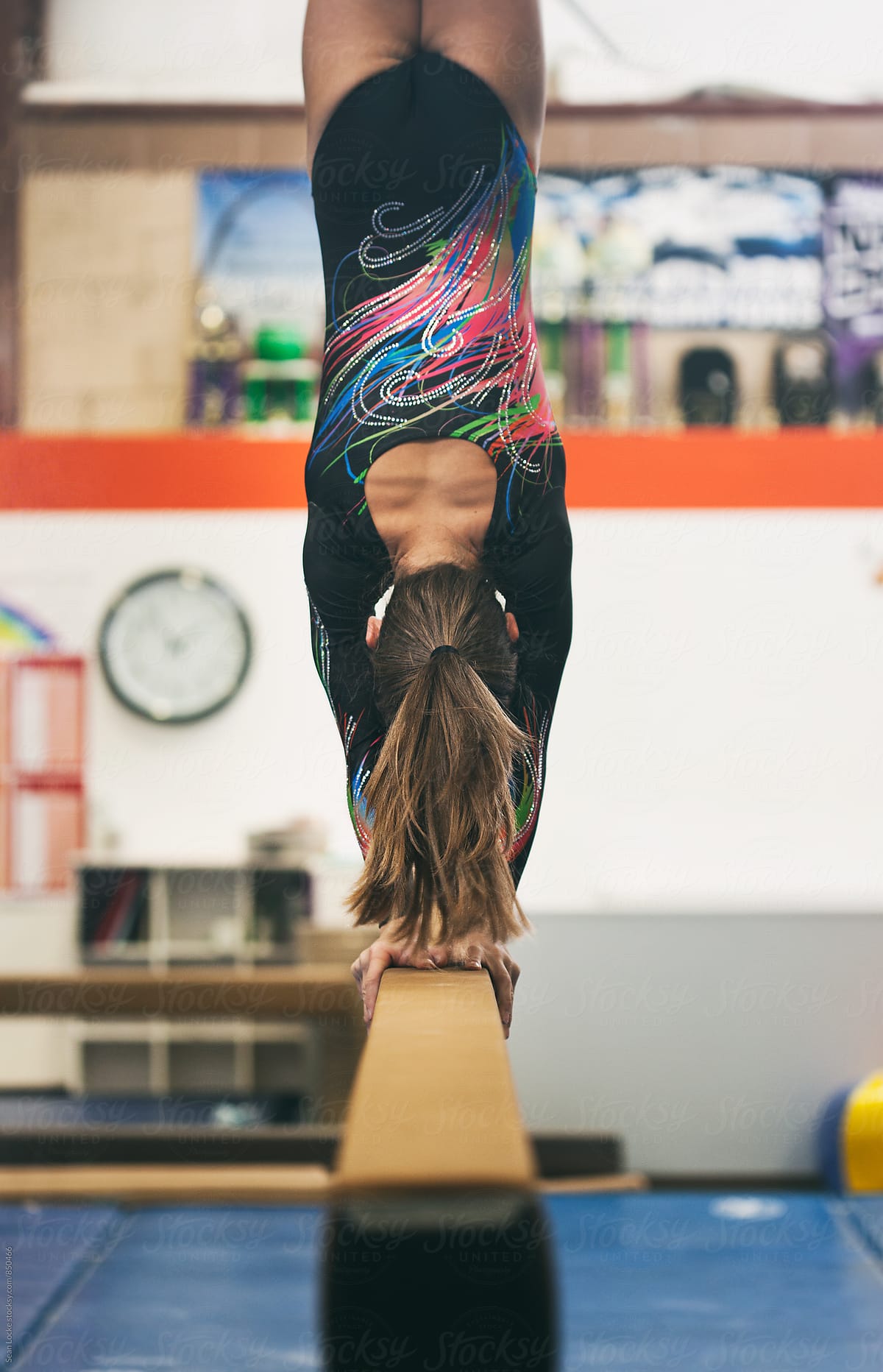 Gymnastics: Girl Does A Handstand On The Balance Beam