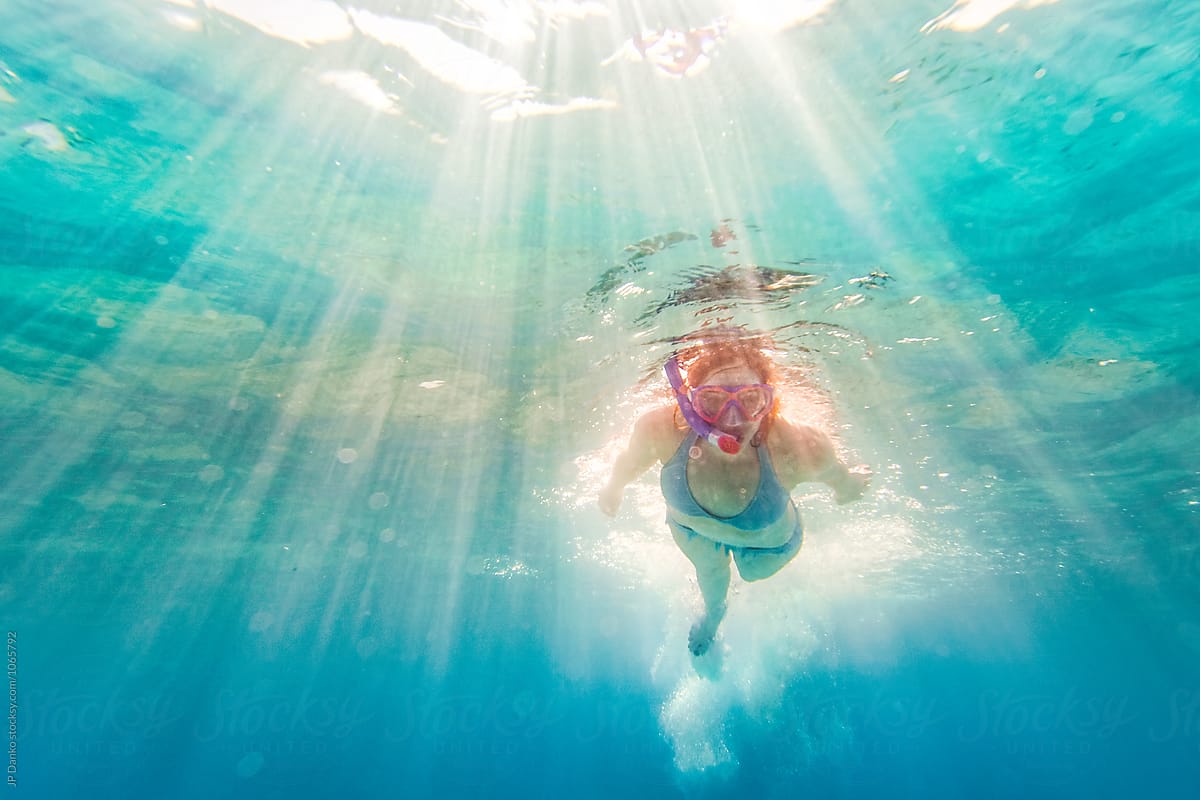 Bikini Woman Swimming Underwater at All Inclusive Caribbean Resort White Sand Beach