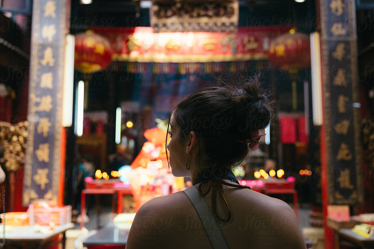 Woman visiting Sin Sze Si Ya temple in Kuala Lumpur