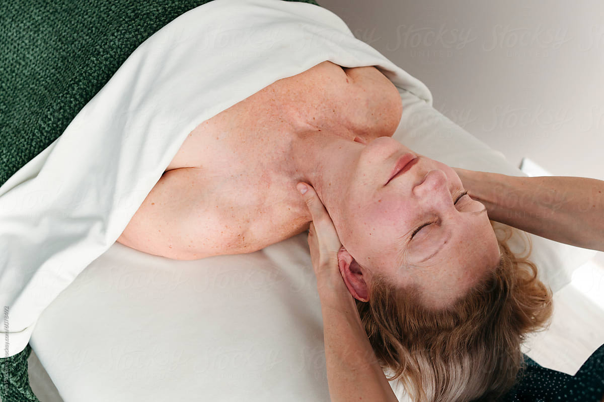 Senior Woman Relaxing on Massage Table