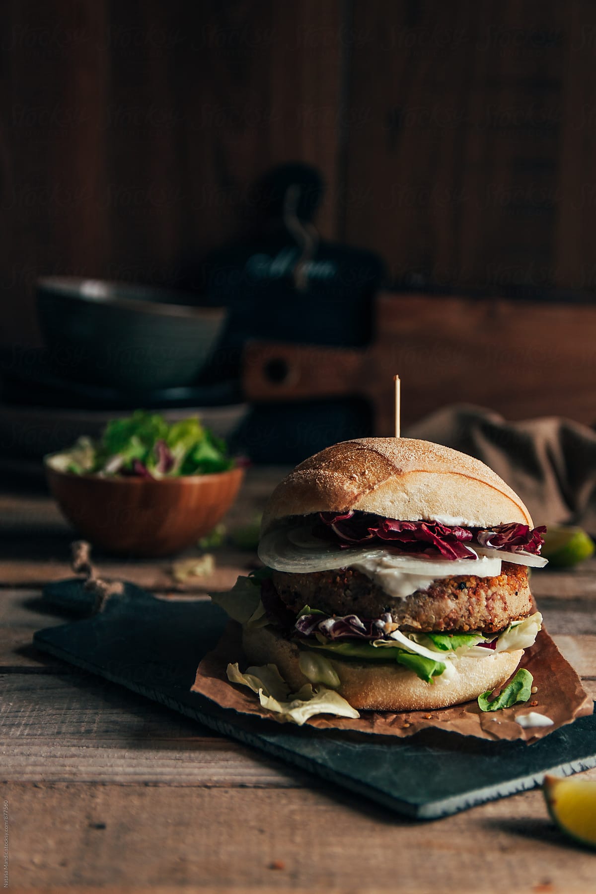 Quinoa burger with salad and onion