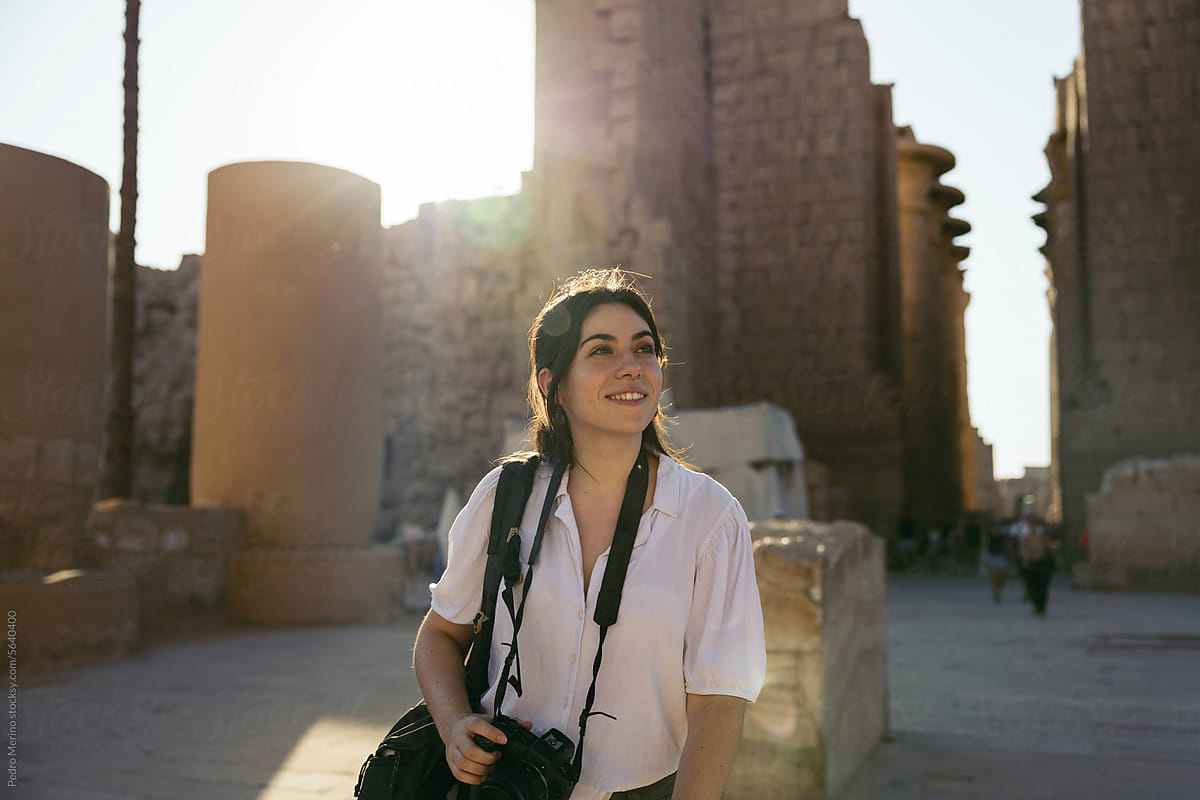 Woman traveling in Egypt visiting the ancient temples