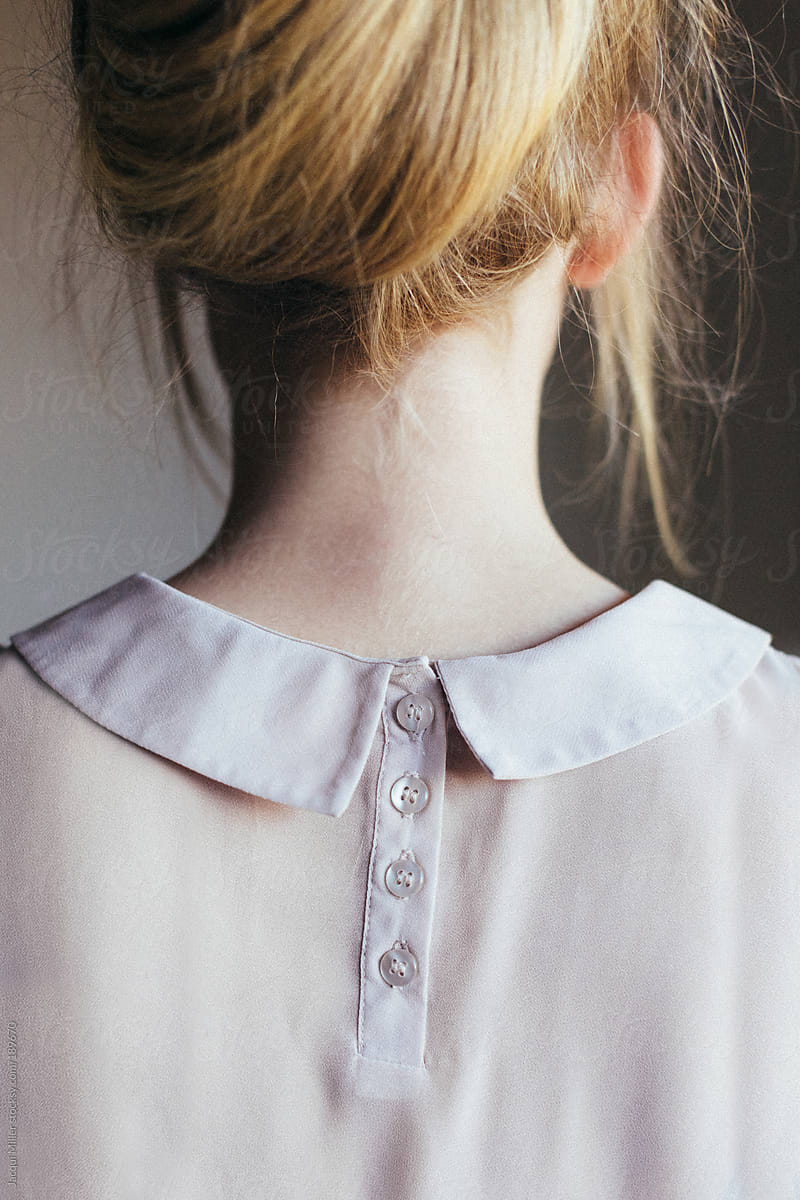 Feminine neck of young woman, from behind