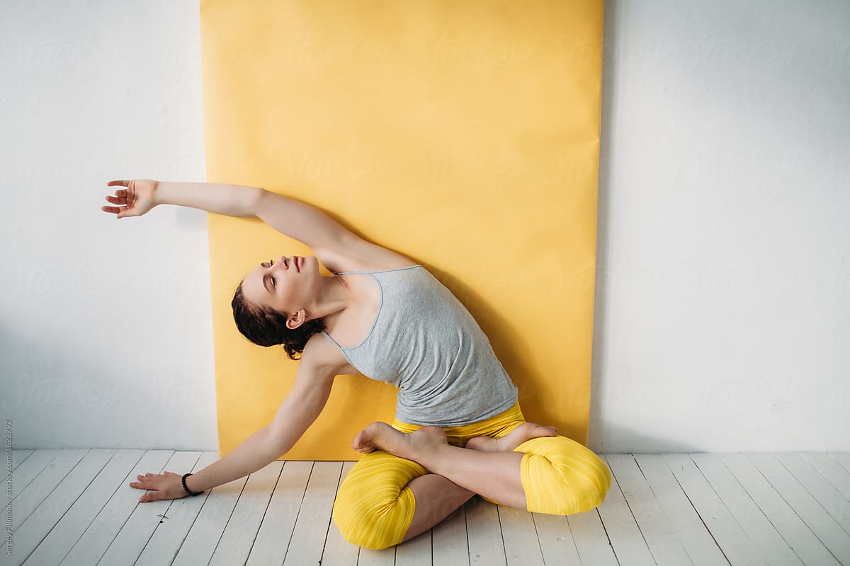 Flexible woman in yoga pose